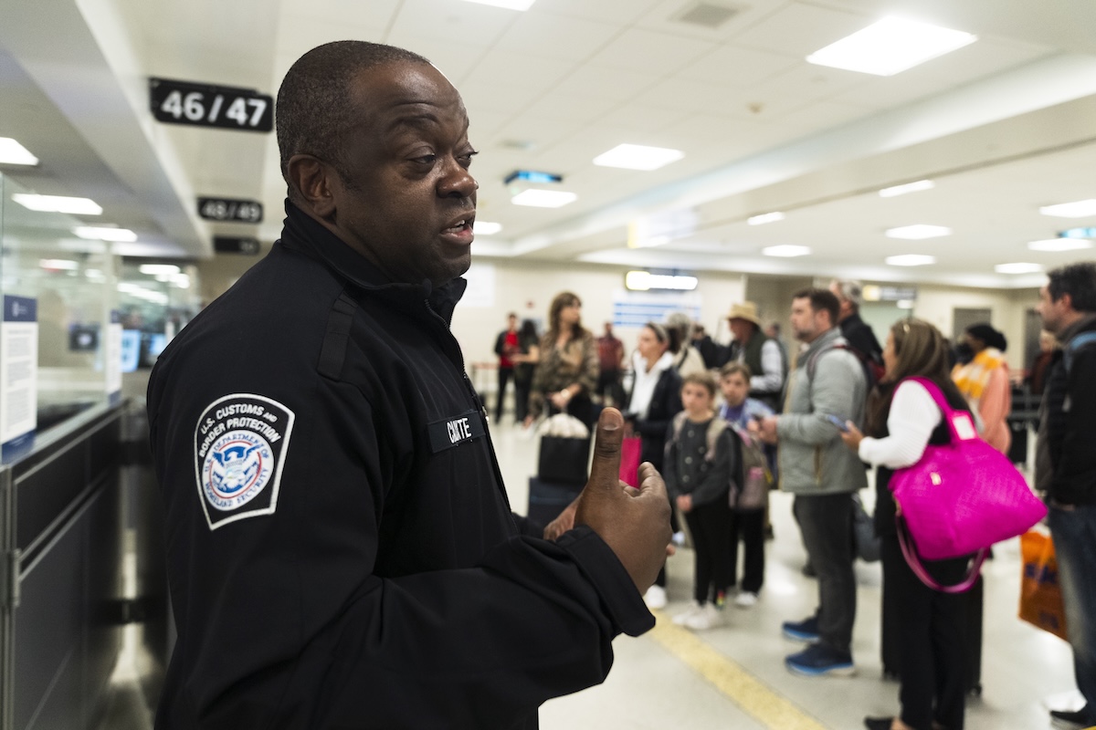 Customs agent inside Dulles Airport 2024