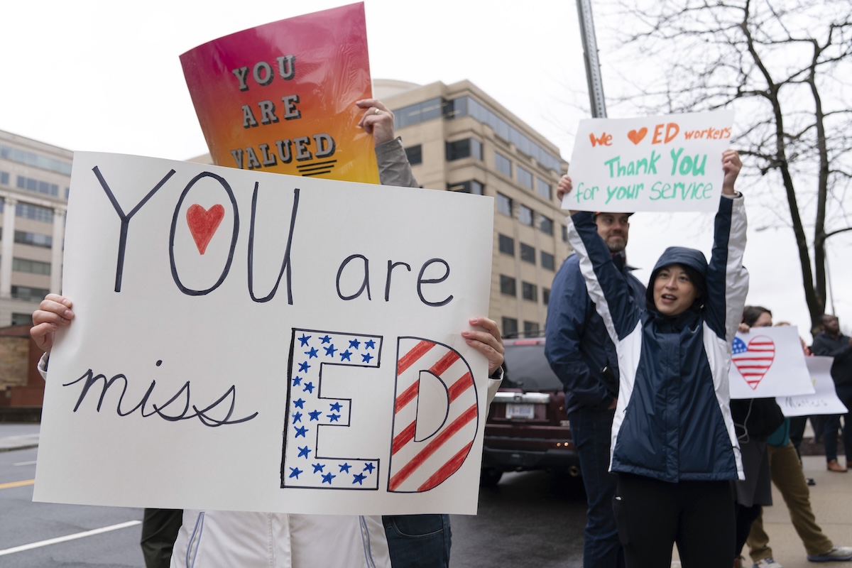 Education Department workers leave building