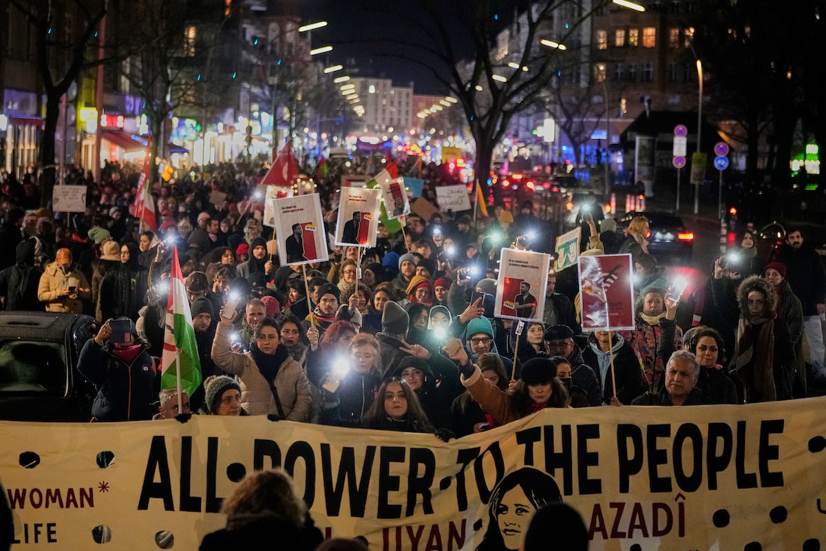 People take part in a rally in support of anti-government protests in Iran, Berlin Germany, Jan 14, 2026. (AP)