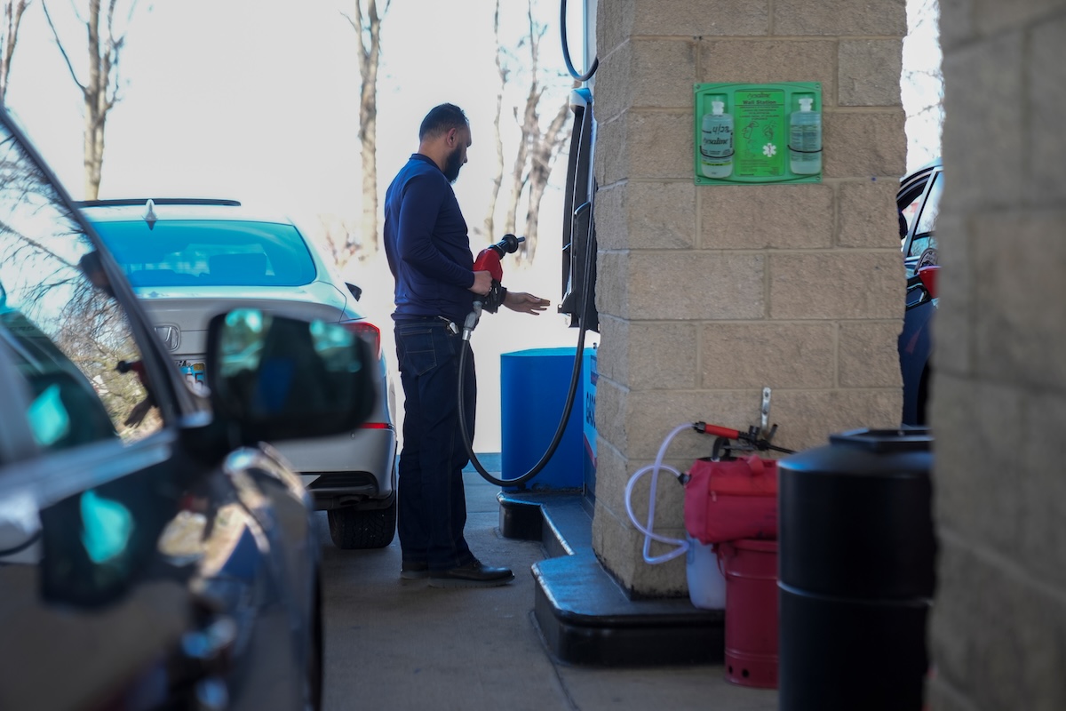 Man pumping gas at Costco in Illinois in 2026