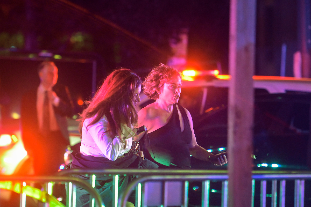 Photo of people being escorted after WHDA shooting
