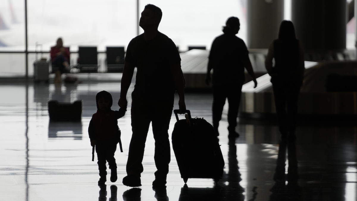 Family silhouette in SLC airport 2023 travel