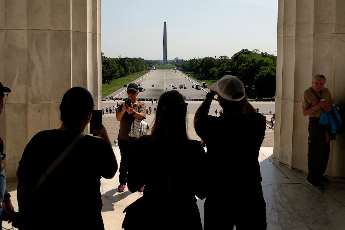 Tourists visiting the Lincoln Memorial in D.C.