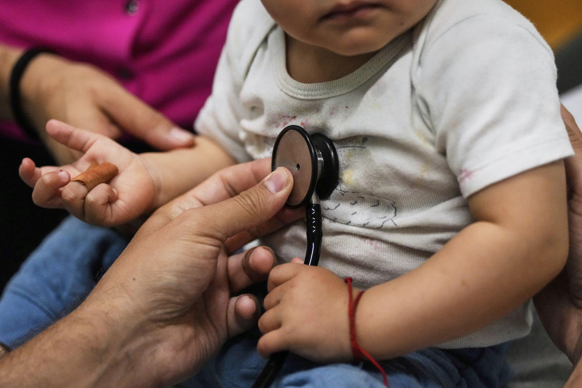 Child visits doctor close up 2025